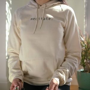 An organic hoodie ”meditate”